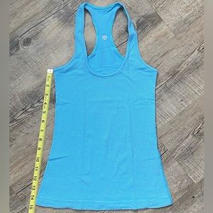 Lululemon Cool Racerback Tank in light blue & violet small stripe color, size 2